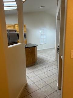 220 S Double Tree Way, Madera, CA 93637 - corridor with light tile patterned floors and lofted ceiling