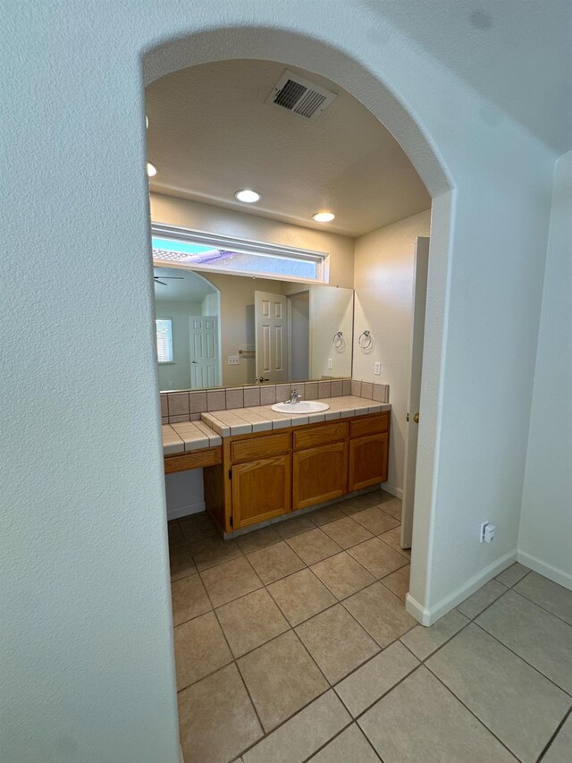 220 S Double Tree Way, Madera, CA 93637 - bathroom with tile patterned floors, vanity, and recessed lighting
