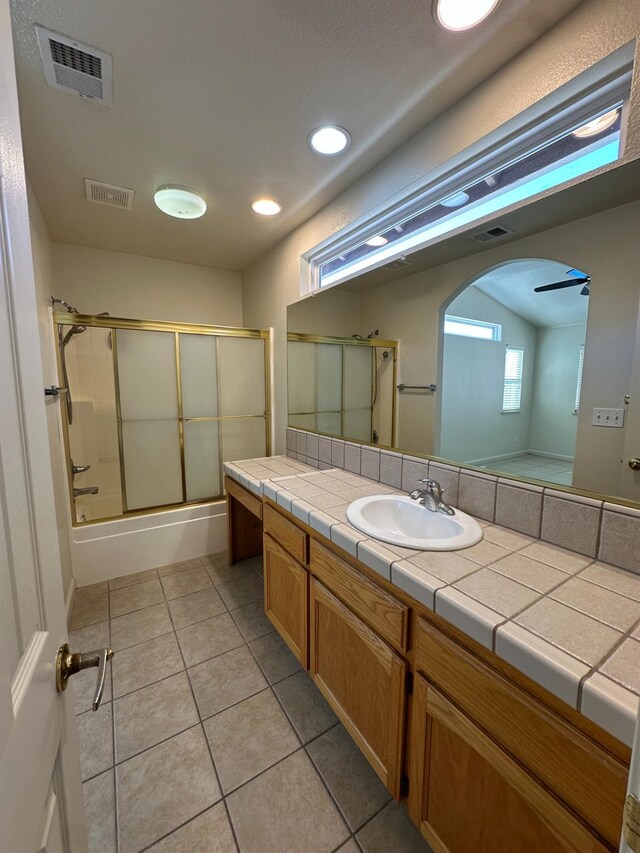 220 S Double Tree Way, Madera, CA 93637 - full bathroom featuring vanity, bath / shower combo with glass door, tile patterned flooring, and recessed lighting