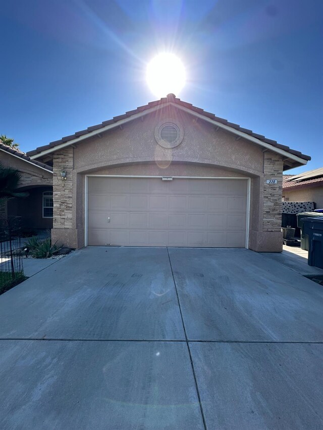 220 S Double Tree Way, Madera, CA 93637 - garage with concrete driveway