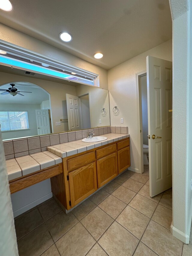 220 S Double Tree Way, Madera, CA 93637 - bathroom with vanity, ceiling fan, tile patterned flooring, and recessed lighting