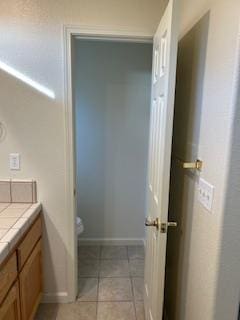 220 S Double Tree Way, Madera, CA 93637 - bathroom with vanity and tile patterned floors