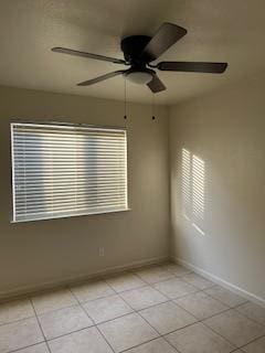 220 S Double Tree Way, Madera, CA 93637 - spare room with light tile patterned floors and a ceiling fan