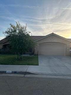 220 S Double Tree Way, Madera, CA 93637 - view of front of house featuring concrete driveway and a garage