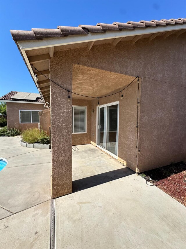 220 S Double Tree Way, Madera, CA 93637 - rear view of property with a patio area and stucco siding