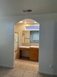 220 S Double Tree Way, Madera, CA 93637 - bathroom featuring vanity and bath / shower combo with glass door