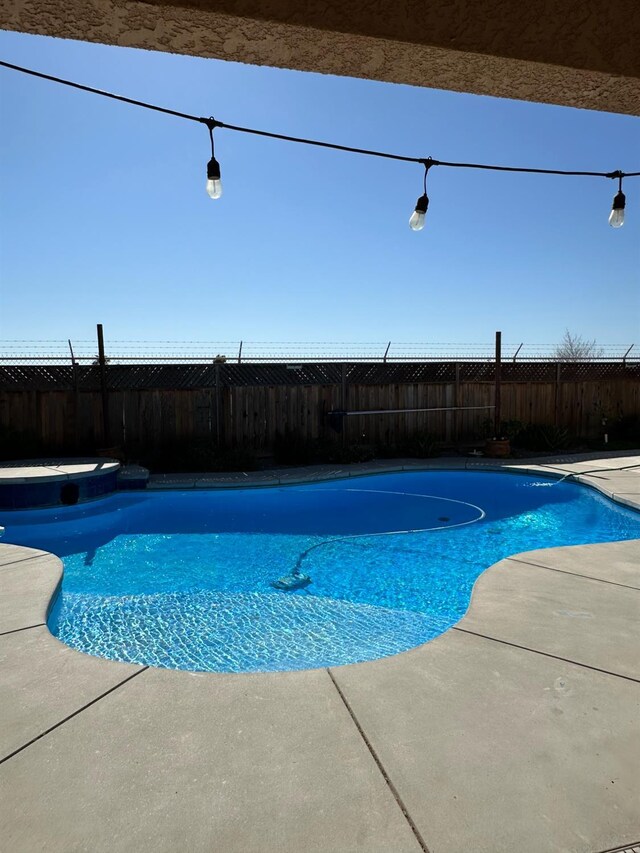 220 S Double Tree Way, Madera, CA 93637 - view of pool featuring a fenced backyard and a patio