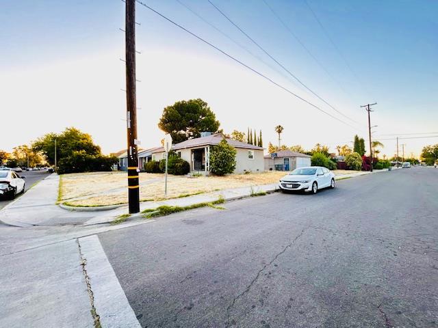 1445 E Cornell Ave, Fresno, CA 93704 - view of asphalt street featuring sidewalks and curbs