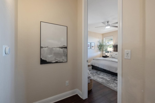 11337 N Cherry Sage Ave, Fresno, CA 93730 - hall with dark wood-style floors and baseboards
