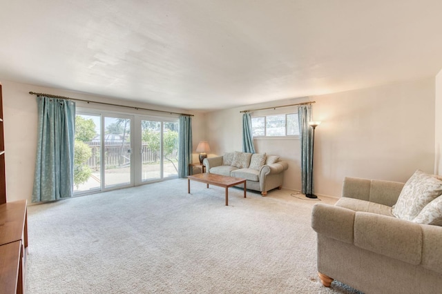 2120 Richard Ave, Sanger, CA 93657 - carpeted living area featuring plenty of natural light