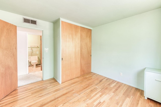 2120 Richard Ave, Sanger, CA 93657 - unfurnished bedroom with wood finished floors and a closet
