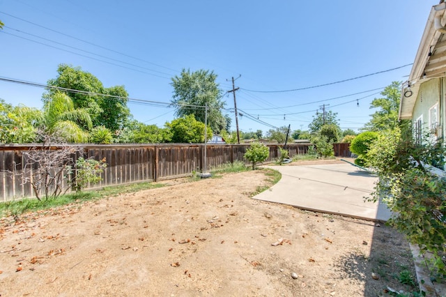 2120 Richard Ave, Sanger, CA 93657 - fenced backyard with a patio