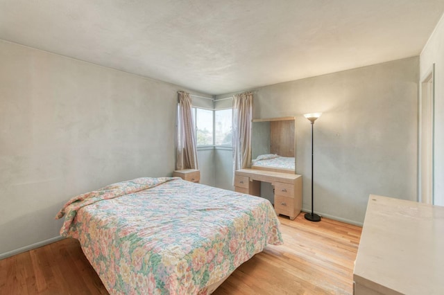 2120 Richard Ave, Sanger, CA 93657 - bedroom featuring light wood-type flooring and baseboards