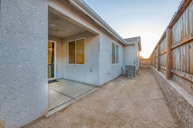 4177 Beverly Ave, Clovis, CA 93619 - view of property exterior with stucco siding, a patio, and a fenced backyard