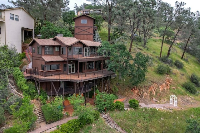 27415 Sky Harbour Rd, Friant, CA 93626 - rear view of house featuring stairway, a wooden deck, and view of scattered trees