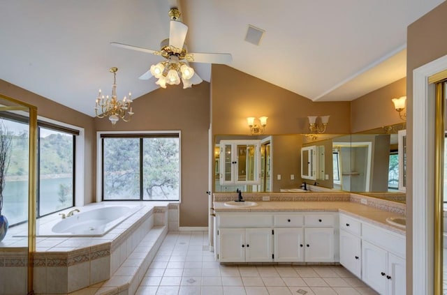 27415 Sky Harbour Rd, Friant, CA 93626 - bathroom featuring double vanity, a bath, healthy amount of natural light, a ceiling fan, and high vaulted ceiling