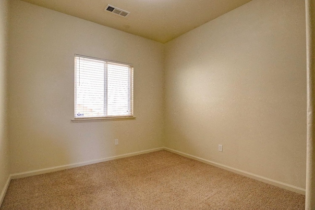 5684 W Holland Ave, Fresno, CA 93722 - unfurnished room with light colored carpet and baseboards
