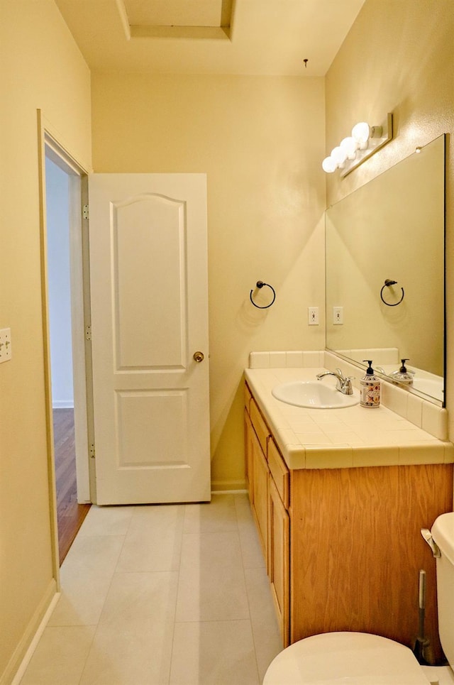 5684 W Holland Ave, Fresno, CA 93722 - bathroom with vanity and tile patterned flooring