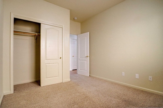 5684 W Holland Ave, Fresno, CA 93722 - unfurnished bedroom with carpet and a closet