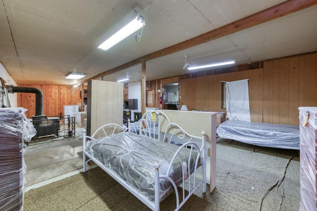 43125 Rd 80, Dinuba, CA 93618 - bedroom with wood walls and a wood stove