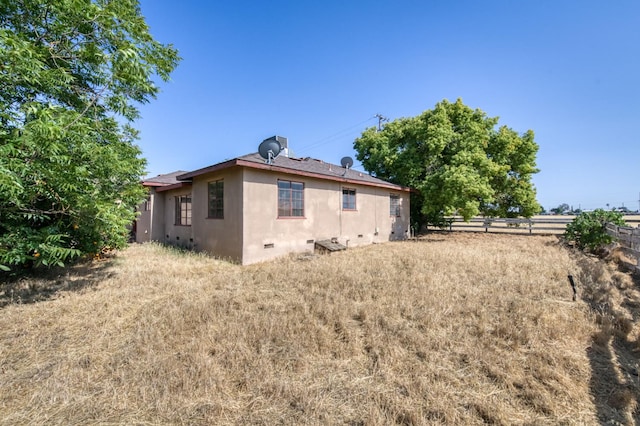 43125 Rd 80, Dinuba, CA 93618 - back of property featuring crawl space and stucco siding