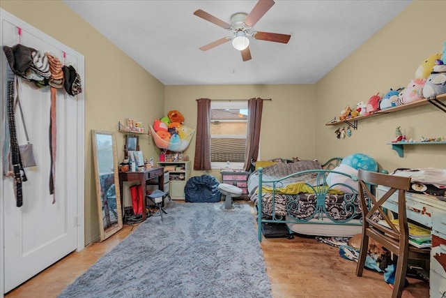 4832 E Illinois Ave, Fresno, CA 93727 - bedroom featuring wood finished floors and ceiling fan