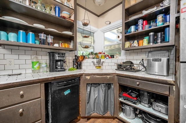 4832 E Illinois Ave, Fresno, CA 93727 - kitchen with open shelves, black dishwasher, tile counters, tasteful backsplash, and dark brown cabinetry