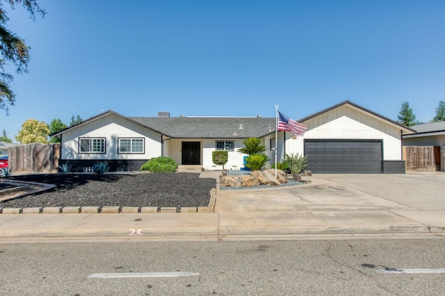 1580 Armstrong Ave, Clovis, CA 93611 - single story home with an attached garage and concrete driveway