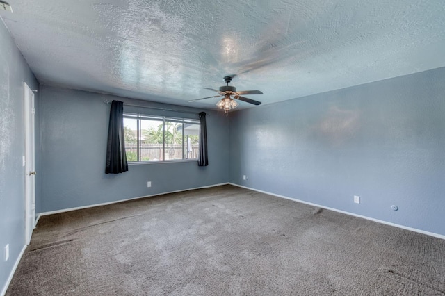 1580 Armstrong Ave, Clovis, CA 93611 - unfurnished room with a ceiling fan, carpet floors, and a textured ceiling