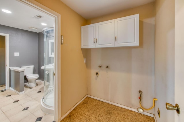 1580 Armstrong Ave, Clovis, CA 93611 - laundry room with baseboards and recessed lighting