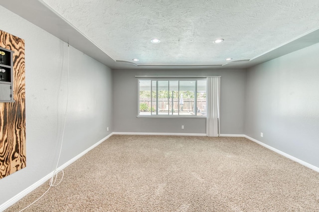 1580 Armstrong Ave, Clovis, CA 93611 - carpeted empty room featuring a textured ceiling and recessed lighting