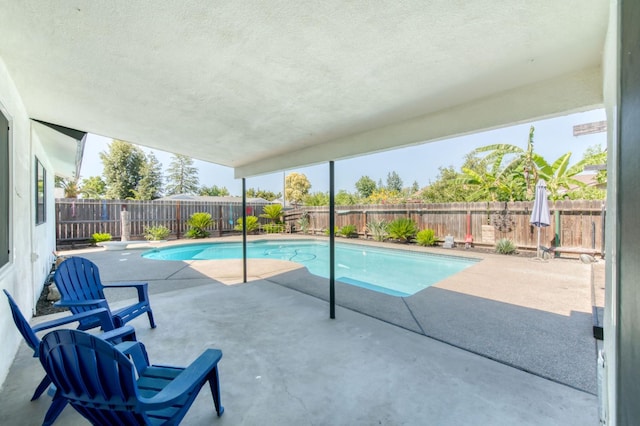 1580 Armstrong Ave, Clovis, CA 93611 - view of swimming pool featuring a patio area and a fenced backyard