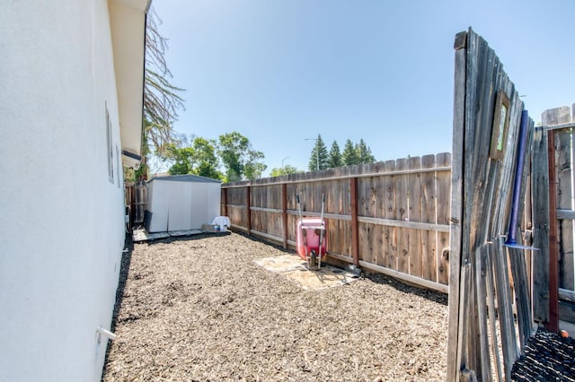 1580 Armstrong Ave, Clovis, CA 93611 - fenced backyard with a storage shed