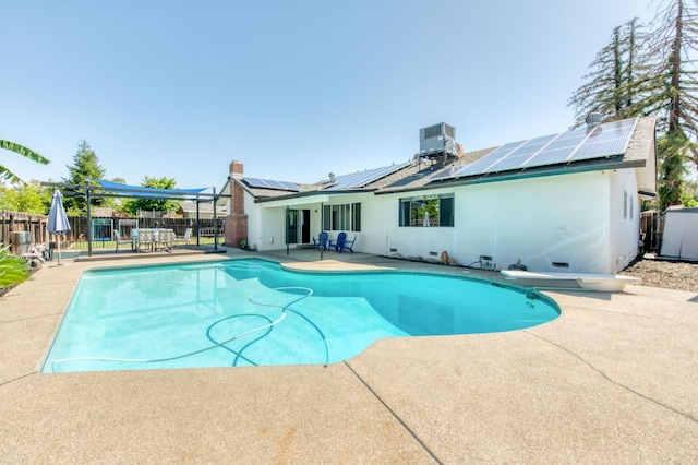 1580 Armstrong Ave, Clovis, CA 93611 - view of pool featuring a patio, a fenced backyard, and a diving board
