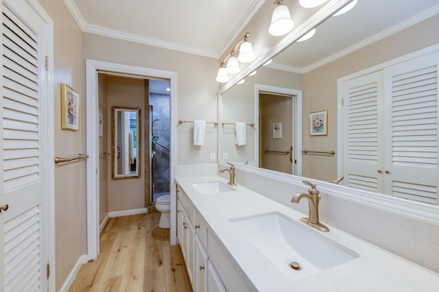 5039 N Van Ness Blvd, Fresno, CA 93711 - bathroom with double vanity, wood finished floors, crown molding, and an enclosed shower