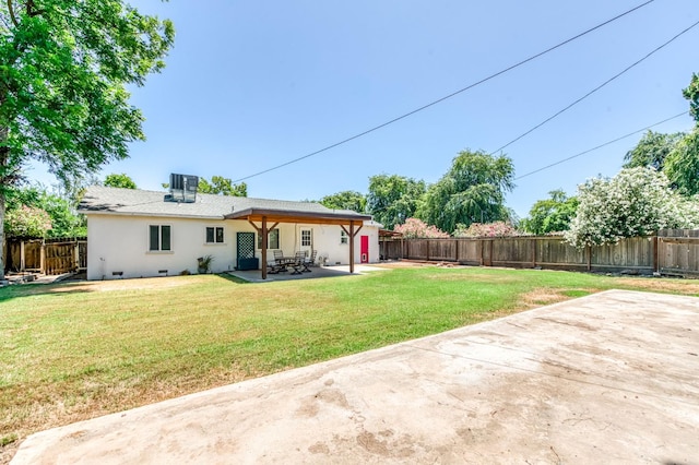 4611 N Safford Ave, Fresno, CA 93704 - back of house featuring a patio area, a fenced backyard, and stucco siding