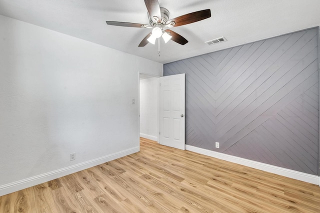 4611 N Safford Ave, Fresno, CA 93704 - spare room with ceiling fan and light wood-style floors