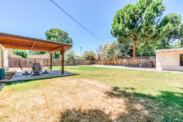 4611 N Safford Ave, Fresno, CA 93704 - fenced backyard with a patio area