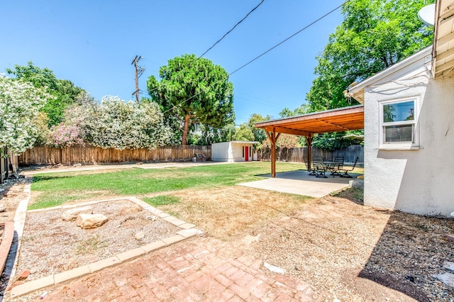4611 N Safford Ave, Fresno, CA 93704 - fenced backyard with a patio and a storage shed