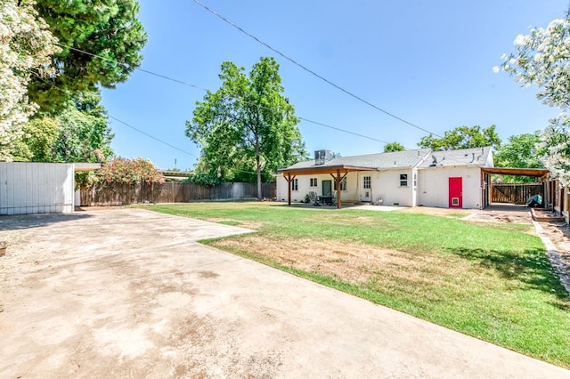 4611 N Safford Ave, Fresno, CA 93704 - fenced yard featuring a patio area