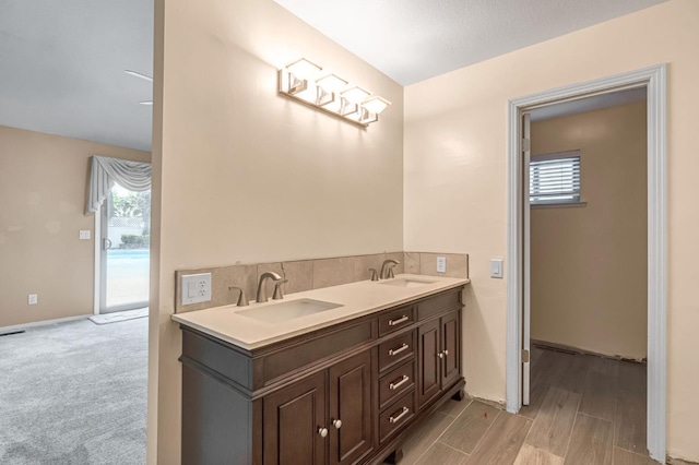 3547 W Locust Ave, Fresno, CA 93711 - full bath with plenty of natural light, double vanity, and wood finished floors