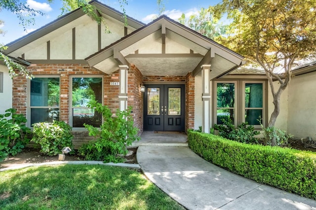 3547 W Locust Ave, Fresno, CA 93711 - property entrance featuring french doors, stucco siding, and brick siding