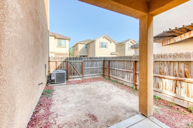 5516 N Sebastian Ln, Fresno, CA 93722 - fenced backyard with a patio area and a residential view