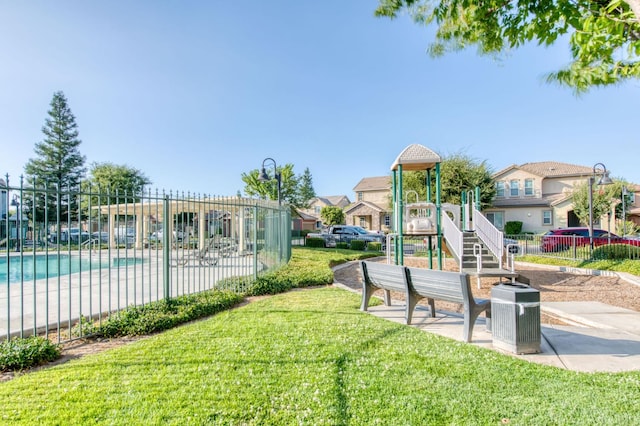 5516 N Sebastian Ln, Fresno, CA 93722 - community play area featuring a community pool and a residential view