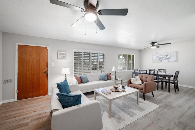 1711 W Weldon, Fresno, CA 93705 - living area featuring ceiling fan and light wood finished floors