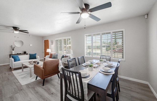 1711 W Weldon, Fresno, CA 93705 - dining room featuring a ceiling fan and wood finished floors