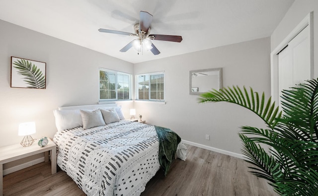 1711 W Weldon, Fresno, CA 93705 - bedroom with wood finished floors, ceiling fan, and a closet