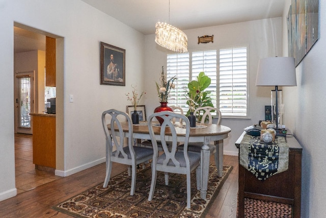 2518 Keats Ave, Fresno, CA 93611 - dining space with wood finished floors and a chandelier