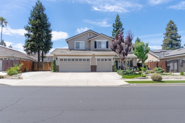 2518 Keats Ave, Fresno, CA 93611 - view of front of property featuring an attached garage, concrete driveway, and brick siding