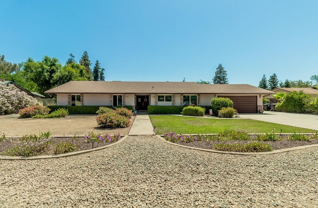 11851 Waverly Rd, Madera, CA 93636 - ranch-style home with a garage, driveway, and a front lawn